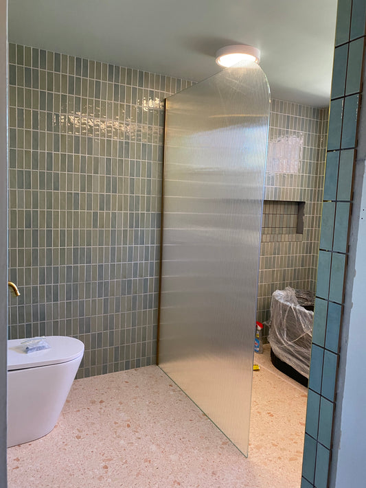 Fluted glass shower panel - radius corner - 1200mm wide